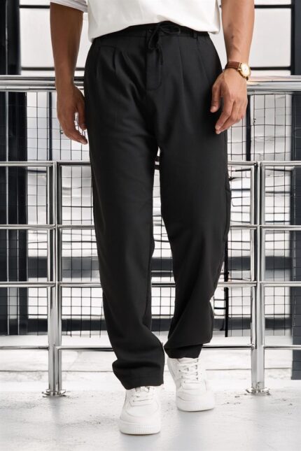 <tc>Pantalon jogger pour homme avec plis doubles à l'avant, taille zippée et élastiquée_x000D_

</tc>