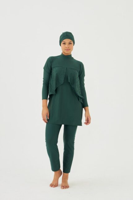 <tc>Maillot de bain modest entièrement couvrant à manches longues, en lycra, avec broderie.</tc>